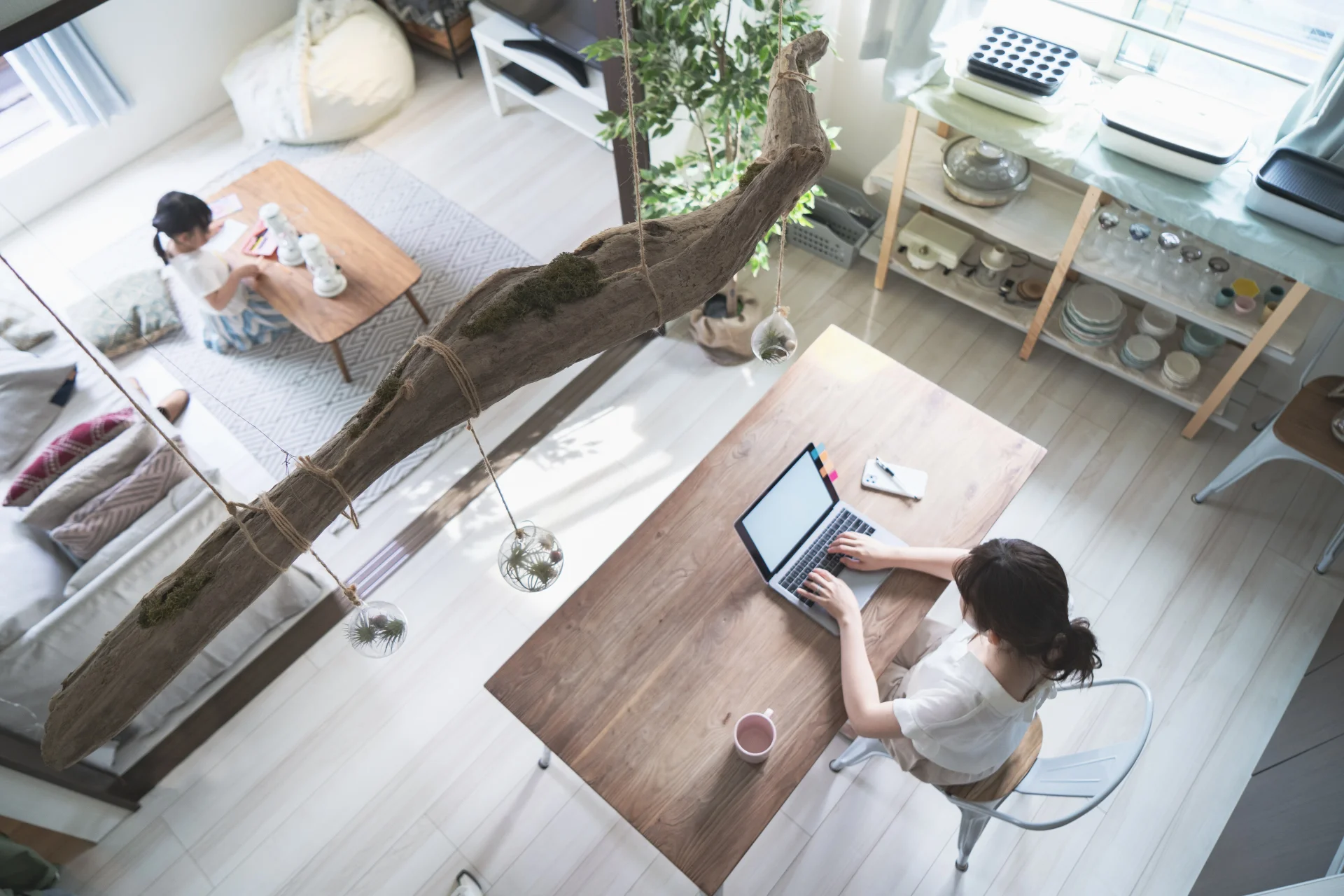 Dummy image: A bright modern Japanese living room staying comfortably cool during summer heat
